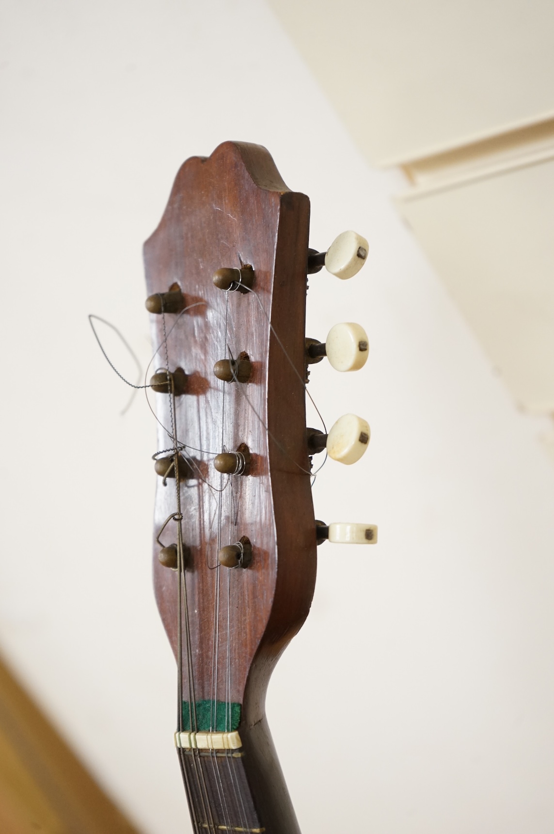 An early 20th century Italian cased mandolin by Carlo Ricordo, Napoli, with spruce soundboard inlaid with tortoiseshell